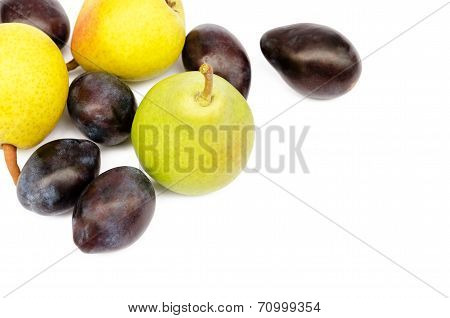 Plums And Pears On A White Background
