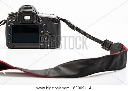 Professional modern DSLR camera - detail of the top LCD with settings - shutter speer, aperture, ISO, AF mode, battery info, RAW format indication,...