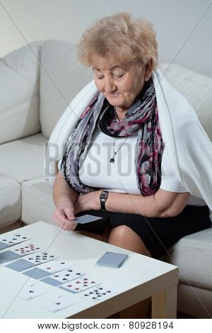 Elder Woman Playing Solitaire