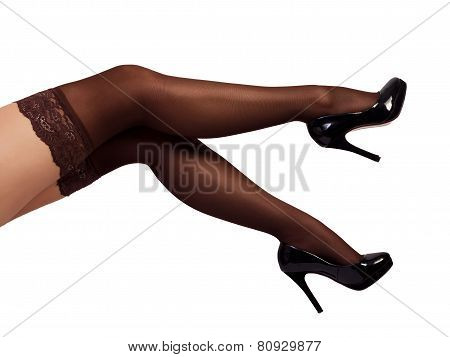 Sexy Woman Legs Wearing Pantyhose And Black High Heels