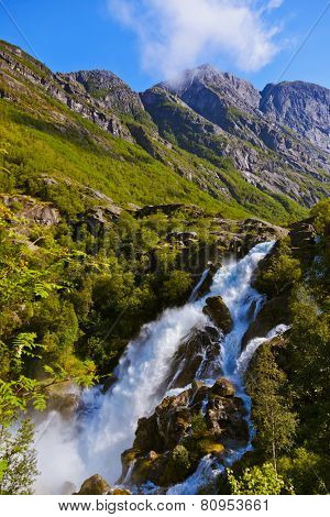 Waterfall near Briksdal glacier - Norway - nature and travel background