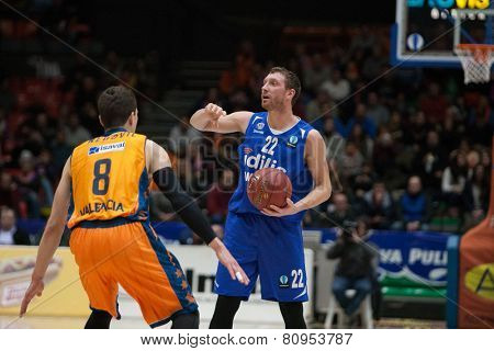 VALENCIA, SPAIN - JANUARY 21: Runkauskas with ball during Eurocup match between Valencia Basket Club and CSU Asesoft at Fonteta Stadium on January 21, 2015 in Valencia, Spain