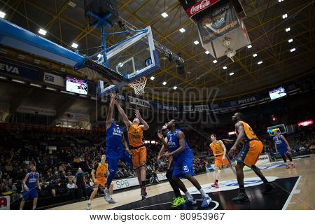 VALENCIA, SPAIN - JANUARY 21: Players fighting for a ball during Eurocup match between Valencia Basket Club and CSU Asesoft at Fonteta Stadium on January 21, 2015 in Valencia, Spain