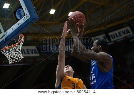 VALENCIA, SPAIN - JANUARY 21: Cooper with ball and Aguilar during Eurocup match between Valencia Basket Club and CSU Asesoft at Fonteta Stadium on January 21, 2015 in Valencia, Spain