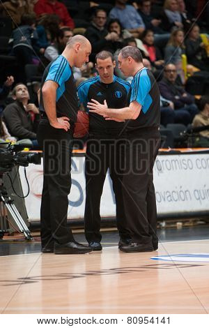 VALENCIA, SPAIN - JANUARY 21: Referees Team during Eurocup match between Valencia Basket Club and CSU Asesoft at Fonteta Stadium on January 21, 2015 in Valencia, Spain