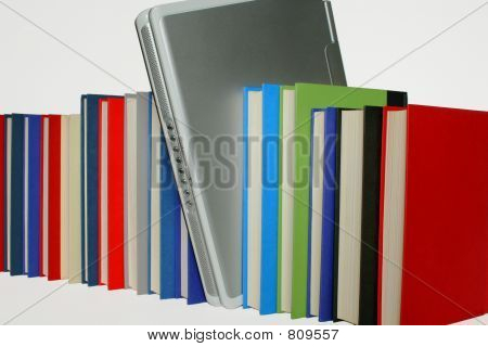 Laptop between Books