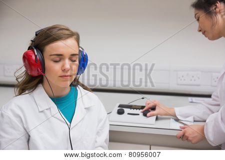 Student doing a hearing test at the university
