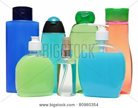 colored plastic bottles with liquid soap and shower gel.