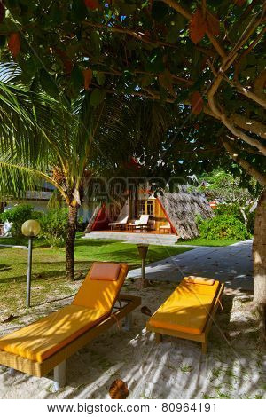 Chairs on tropical beach at Seychelles - vacation background