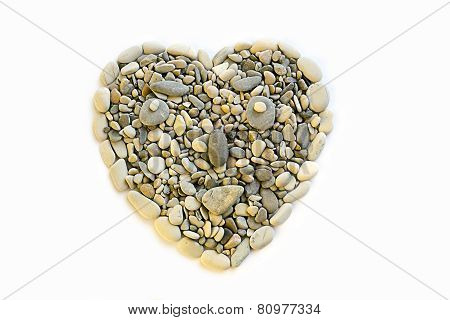 Heart of stones laid out on a white background