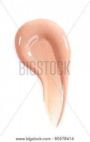 Liquid Beige Make Up Foundation on White Background Smeared