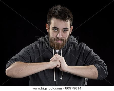 Serious Man with Closed Fist In Front his Body