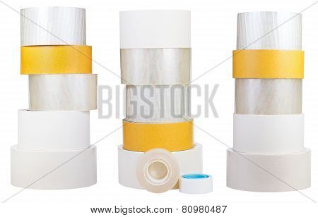 Set Of Stacks Of Adhesive Tape Rolls Isolated On White