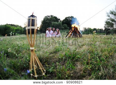 Ukrainian Girl In Shirts Sitting Around The Campfire