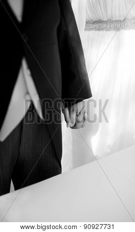 Bride And Groom Holding Hands In Wedding Marriage Ceremony