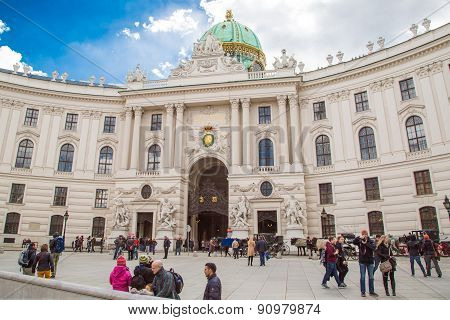 People walking at Michaelerplatz in Vienna, Austria