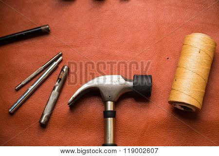 Leather Crafting Tools On Work Table.