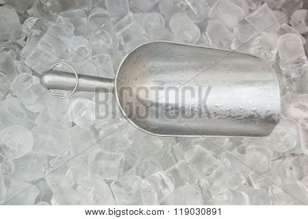 Closeup Ice Scoop on cube ice background