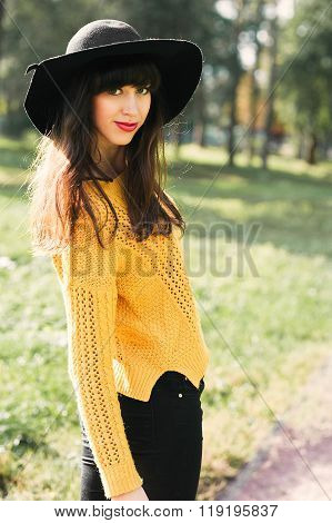 Portrait Of A Brunnete Happy And Smiling Girl