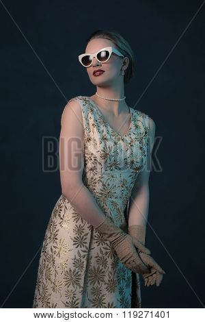 Chique Vintage 50S Fashion Woman Wearing Sunglasses.