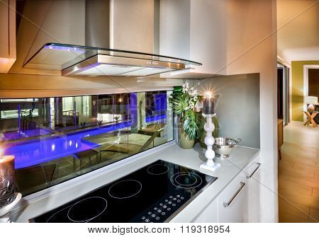 Modern Vitroceramic Stove In The Kitchen At Night