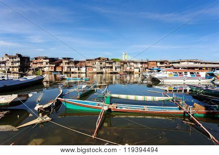 Poor Houses By The River In Shantytown