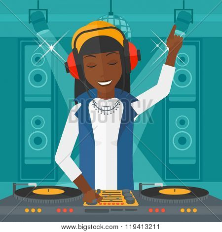 Smiling DJ with console.