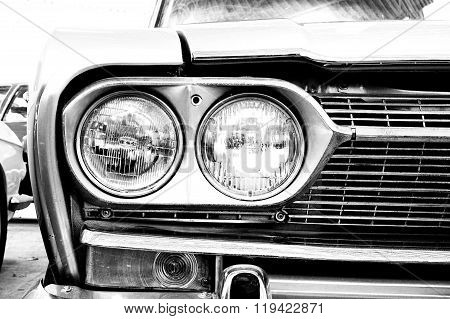 Close Up Of Headlight Lamp Vintage Classic Car. (vintage Effect Style)