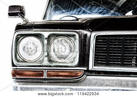 Close Up Of Headlight Lamp Vintage Classic Car. (vintage Effect Style)