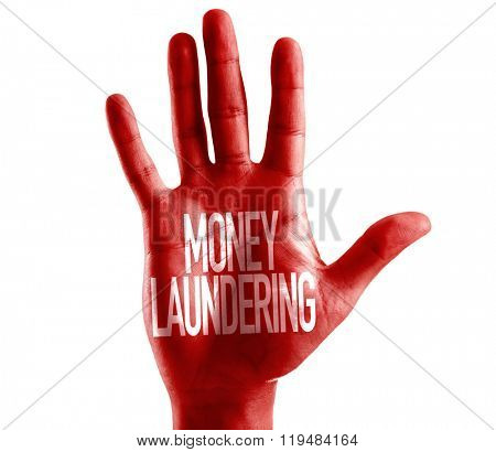 Money Laundering written on hand isolated on white background