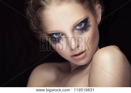 Girl With Crying Make Up On Black Background