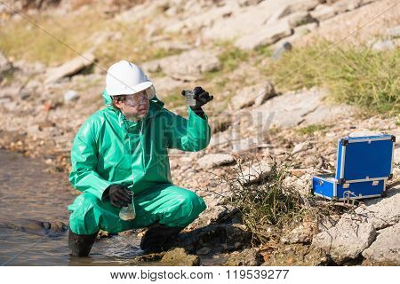 Environmentalist With Samples Od Polluted Water
