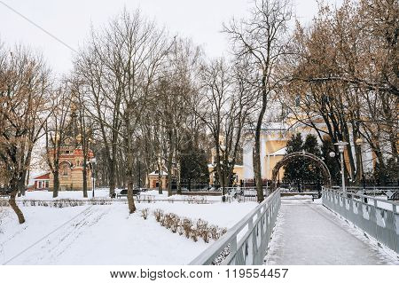 Bridge leading to the Peter and Paul Cathedral in city park in G