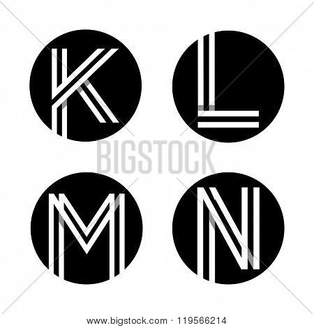 Capital letters K, L, M, N.  In a black circle.