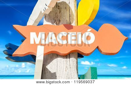 Maceio welcome sign with beach