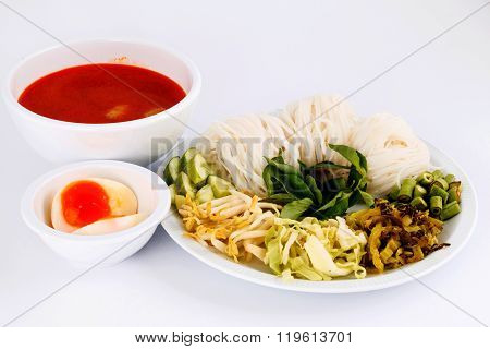 Vermicelli solution and fish curry coconut milk with vegetable. (Kanom Jeen Nam Ya)