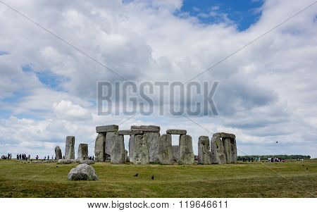 Stonehenge with many tourists.