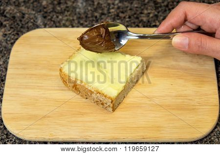 Sandwich with butter and chocolate.