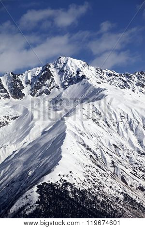 Snowy Mountain Peak At Sunny Day