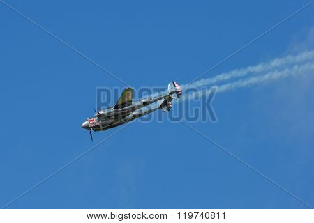 SPIELBERG, AUSTRIA - OCTOBER 26, 2014: Lockheed P-38 Lightning flys in a flight display during the Red Bull Air Race.