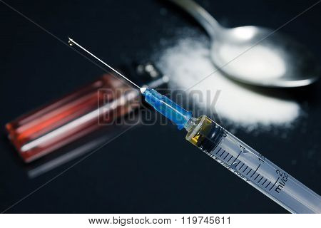 syringe , heroin, cocaine, spoon