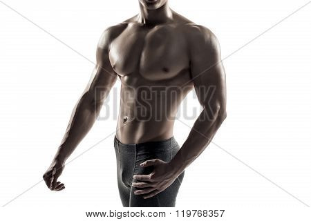 Strong man showing perfect body, abs and chest. Close-up