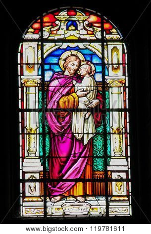 GARACHICO SPAIN - JANUARY 20 2016: Stained Glass depicting Saint Joseph and the Child Jesus in the church of Santa Ana in Garachico Tenerife Canary Islands Spain
