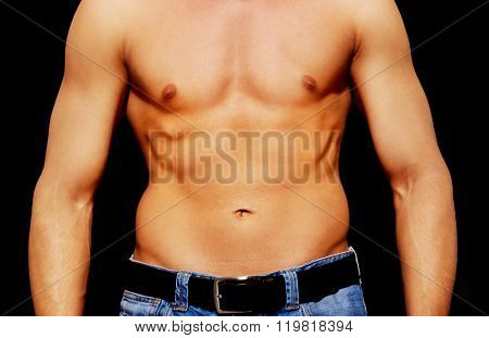 Young athletic man with muscular torso