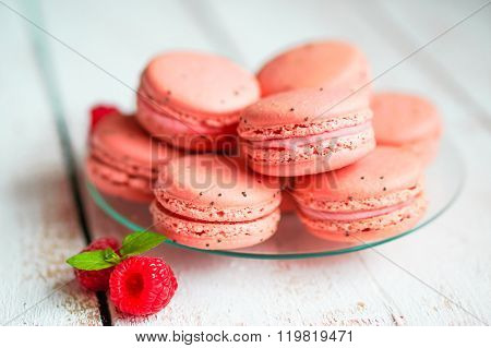 Raspberry Macaroons With Berries On Wooden Table