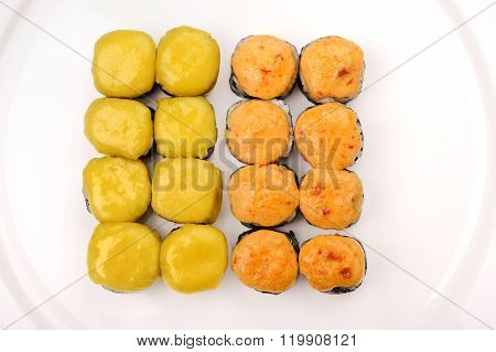 Set Of Baked Cheese Rools On White Plate