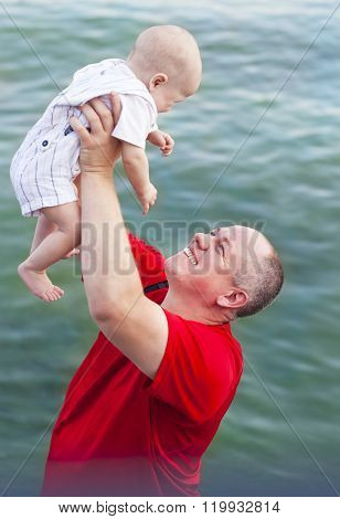 Middle Age Father And His Little Baby Son