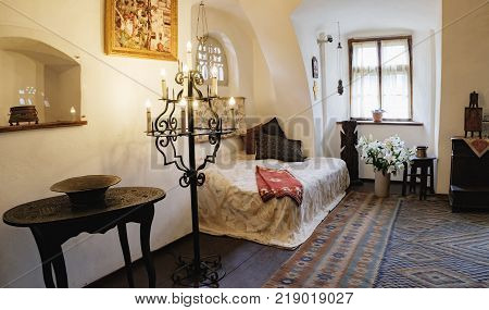 Bran, Romania - September 7, 2017: One of the bedrooms of the Bran or Dracula Castle in Transylvania, Romania.