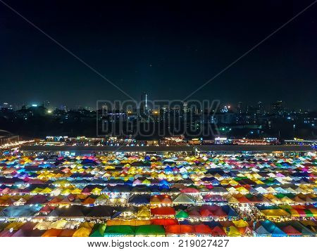 Panorama Landscape View Colorful Of Plastic Roof Of Tent At Ratchada Train Night Market With Dark Sk