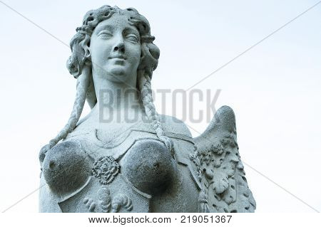 Closeup statue white stone of woman sphinx in Belvedere Baroque Garden Vienna Austria